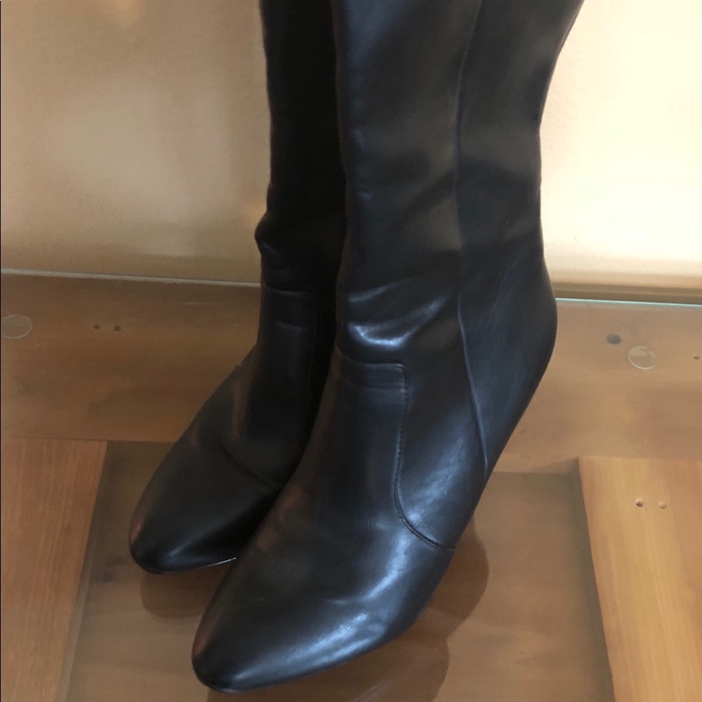 Gently used tall black boots.